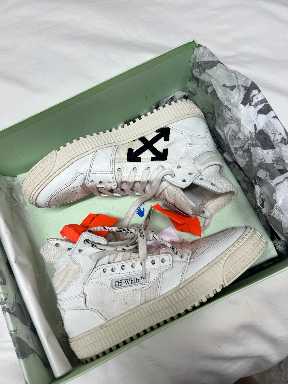 Off-White High-Top Sneakers with Black Arrow Logo